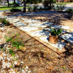 Image taken from from of the house looking towards the street. You'll find the limestone walkway leading to the front beds.