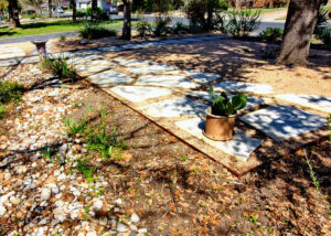 Image taken from from of the house looking towards the street. You'll find the limestone walkway leading to the front beds.